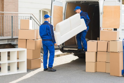 Furniture and boxes being loaded into a van for a South Norwood move