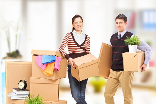 Removal team handling furniture during a local house relocation