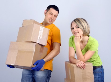 Office furniture and boxes prepared for a local commercial move