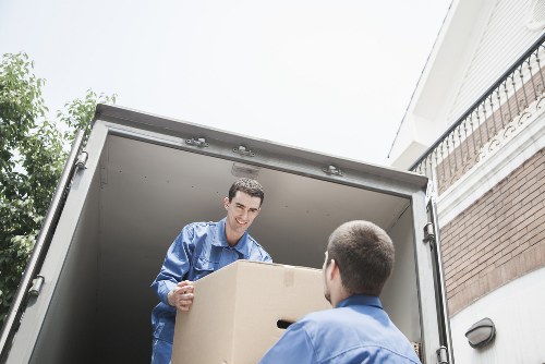 Packed household items and furniture ready for transport in a move