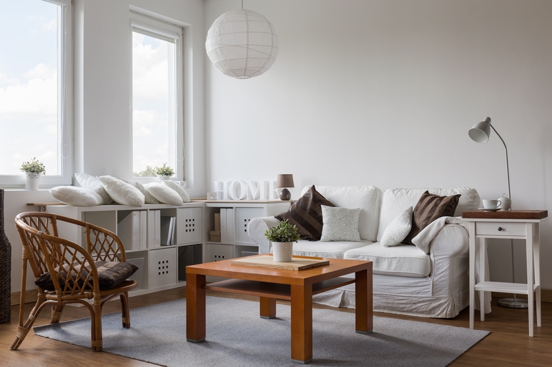 Furniture being carried carefully from a South Norwood home